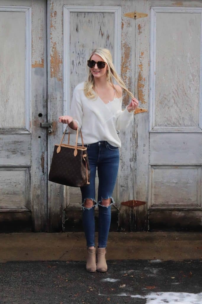 ripped jeans and white sweater