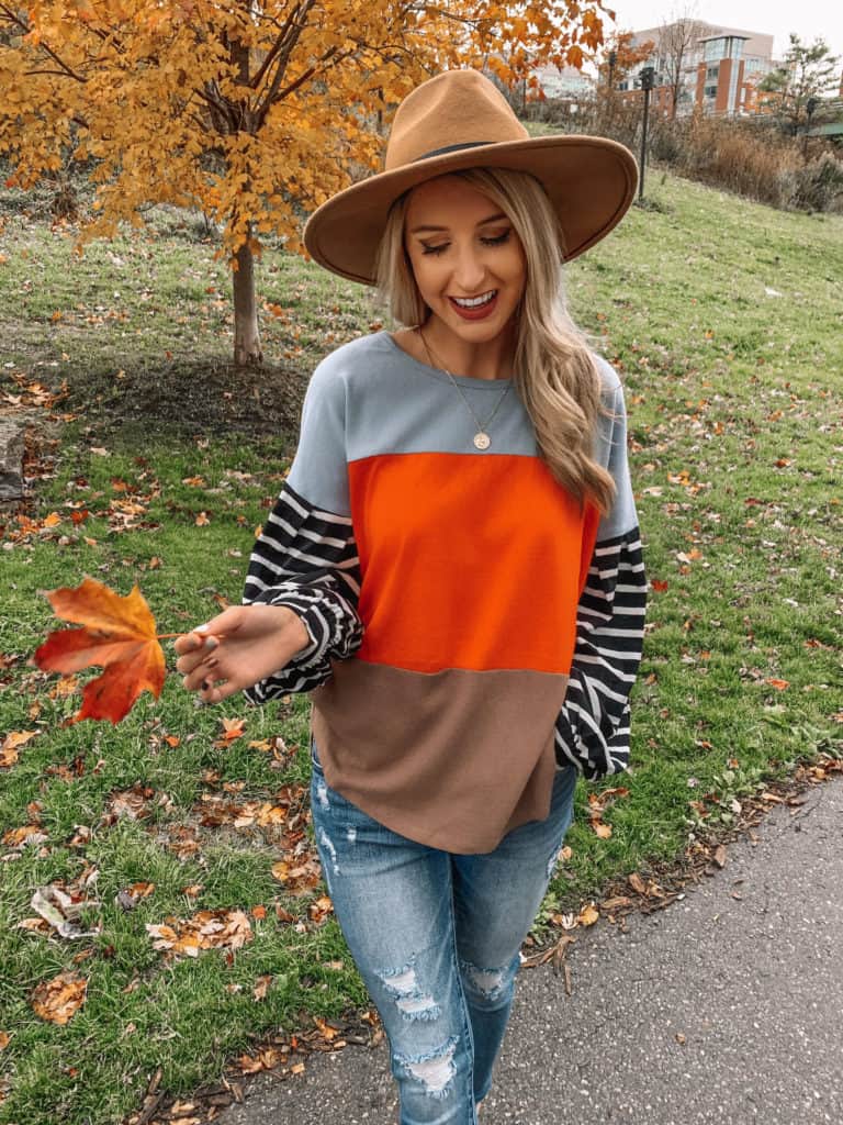 Vici Dolls, striped top, sweater outfit, striped shirt outfit, striped sleeve shirt, fall top 2019, felt fedora, coin necklace, fall fashion, fall outfits, fall outfits 2019, fall 2019 fashion trends, prada and pearls, Vici Dolls, Vici collection, Vici, fashion blogger, prada and pearls #fallfashion #falltop #Vici