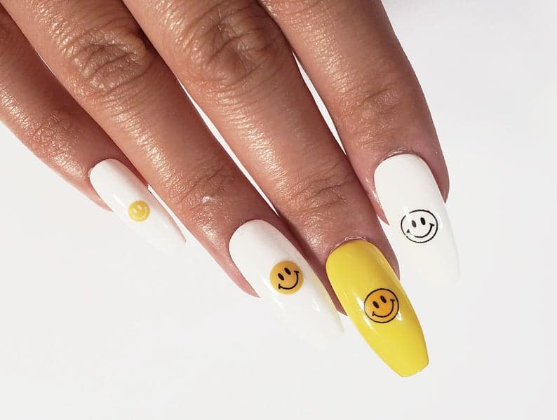 best stick on nail polish, stick on nail polish, press on nails, happy face nails, happy face nail designs, yellow nails, white nails