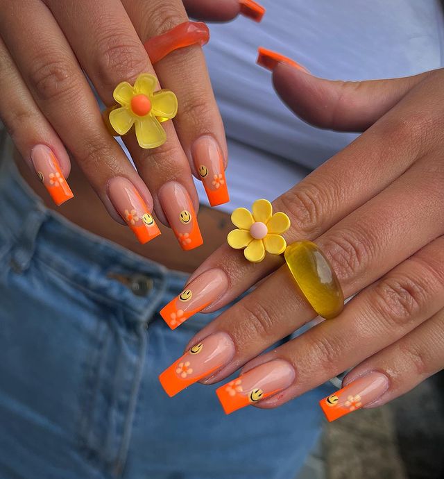 Y2K nails, y2k nails acrylic, y2k nails acrylic long, y2k acrylic short, y2k nails simple, y2k nail designs, y2k nail art, y2k nail ideas, y2k nails simple, orange nails, acrylic nails orange, smiley face nails, square nails