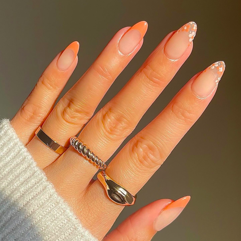 orange tip nail designs, French tip nails, French tip nails with design, bright nails, orange nails, French tip nails orange, floral nails, French tip nails almond
